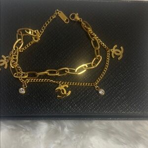 Gold-Tone Charm Bracelet with Logo Pendants